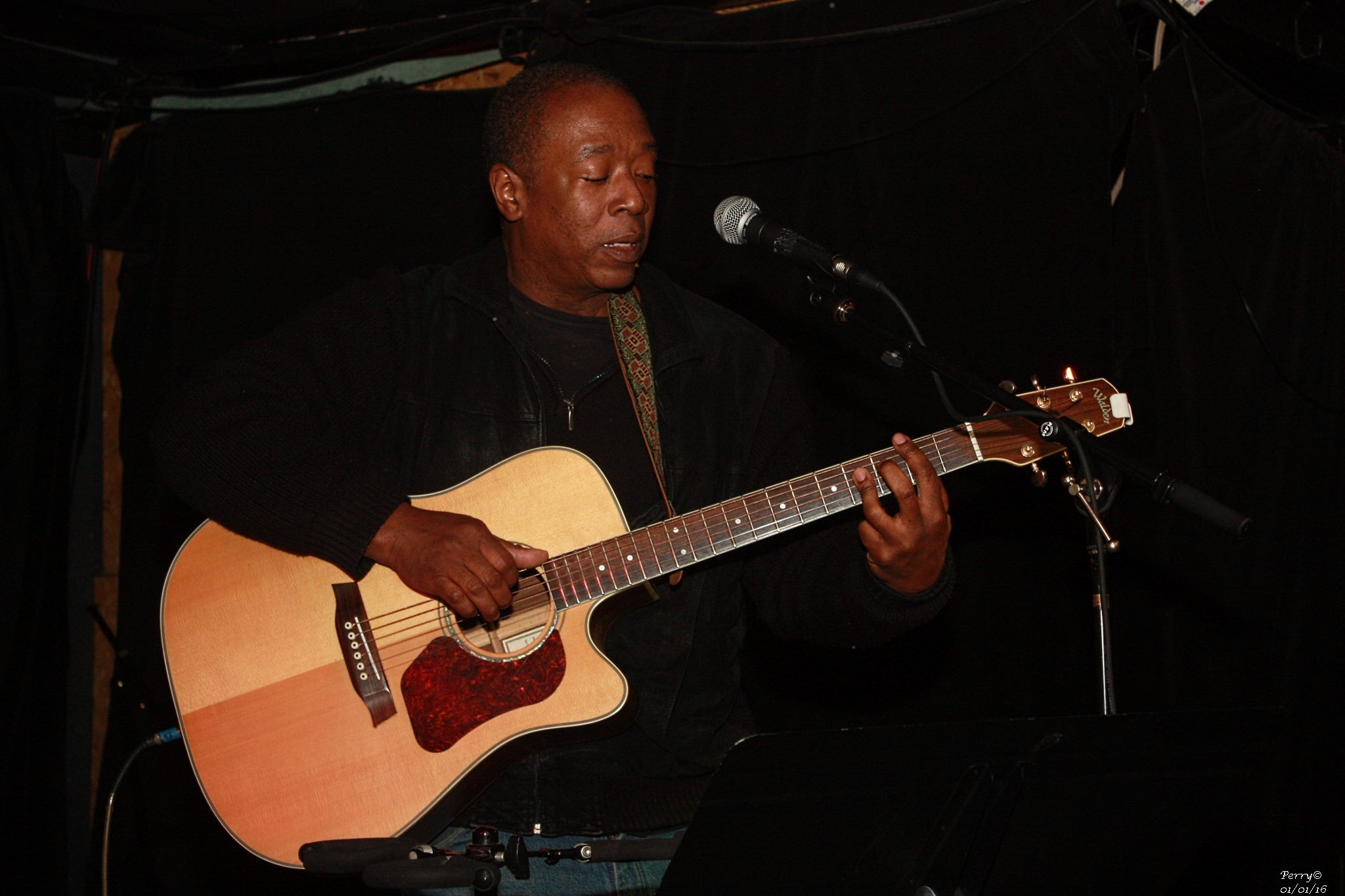 Tyrone Cotton performing live